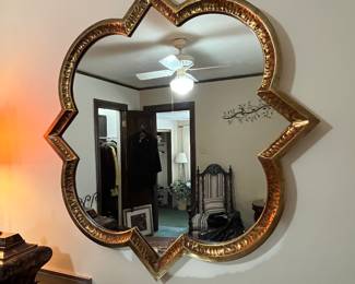 Gold framed wall mirror