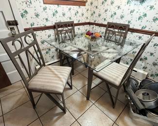 Glass table with 4 chairs