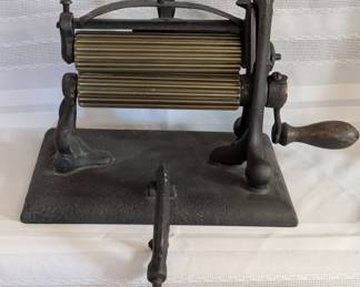 Antique cast iron fluting crimper