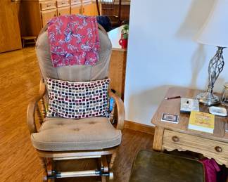 Glider with Upholstered Cushions; Vintage Vinyl Covered Stool; Wood Oak End Table with Drawer; Brushed Chrome Lamp; Decorative Pillow