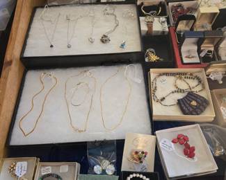 Lots of Costume and Fine Jewelry including 14k Gold, Sterling Silver, Diamond, Topaz, Opals and more; Lisner, Park Lane, Caro, Avon, Delft to name a few.