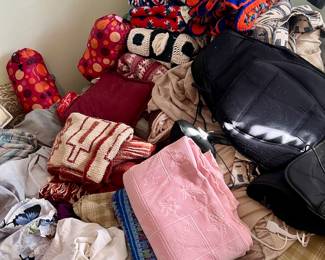 Lots of afghans and handmade blankets