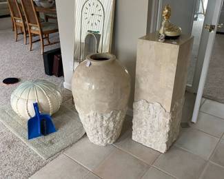 stone pedestal and vase, wall mirror/clock