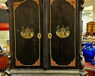 19th c. Small cabinet, the size of a  large jewelry box. Original chinoiserie with Angel on top, Dutch  provenance from 1st Dibs. 30.5 tall, (34 tall with Angel)  19.5 W, 7.5 Depth
Must see.