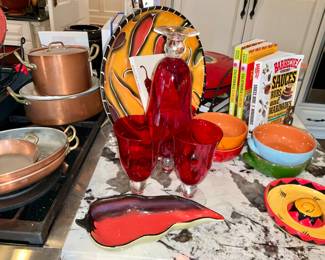 Clay Art platter, "Cayenne".  Lenox Ruby Glasses.  Copper pots