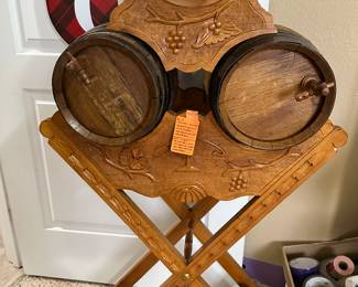 #90 - $160 - Wooden carved wine barrel holder with barrels 26wx10dx32h