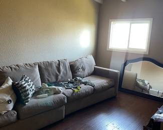 Long sectional sofa with sofa bed - great neutral color.