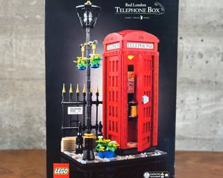 A sealed Lego Ideas #055, Red London Telephone Box set. Spend quality time creating a brick-built version of a British cultural icon: the Red London Telephone Box (21347). A nostalgic London souvenir that makes a great gift idea for travelers and history buffs or Father’s Day! The authentically detailed London phone booth comes with a choice of vintage rotary phone or 1990s-style phone, plus a LEGO light brick that is activated by pressing the roof of the booth. The booth in this collectible LEGO Ideas building set for adults sits in a quintessential London scene, complete with a buildable cobbled street, lamppost and hanging flower baskets, a flowerpot and fence with a street sign. Delightful decor for your home or office, this build and display model can also be used as a cell phone stand.