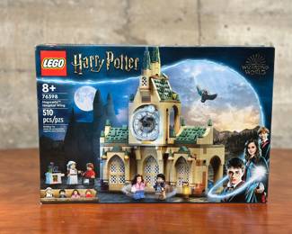 An adult-owned (built-once) Lego Harry Potter Hogwarts Hospital Wing set. Confirmed as a complete set, guaranteed by Salem Auction House with all the original packaging. LEGO® Harry Potter™ Hogwarts™ Hospital Wing (76398) is bursting with magical play possibilities for kids aged 8+, from caring role play in the infirmary to time-travel adventures in the clock tower.