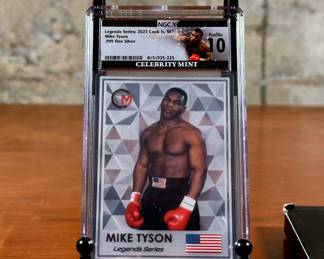 This exclusive 2023 Cook Islands Mike Tyson 3g SILVER foil coin card is a must-have for any collector. The coin card comes graded NGCx 10. The front of the card features a lifelike portrait of the boxing legend, while the back displays relevant information about the coin. Made of .999 fine silver, this proof strike type coin is a great addition to any collection and weighs 3 grams. A product of the Celebrity Mint, this coin is a rare and unique item that is sought after by collectors worldwide. This collectible item comes with the original box, packaging & info card as shown in photos.