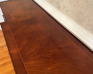 C44- $300.  Trosby Furniture from Sussex England. Buffet With Key a few minor scratches on top.  A beautiful solid piece.   Measures 6' long x 17" deep x 33.5" tall. 