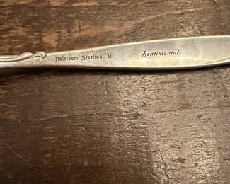 S2 - $1500. "Sentimental" Heirloom Sterling. 10 Forks, 10 Salad Forks, 10 Knives, 10 Spoons. 4 Serving Pieces. 