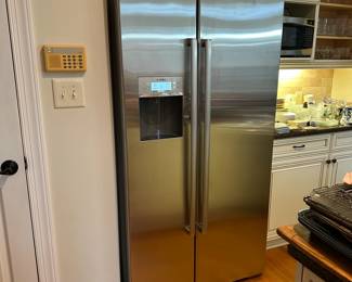 C59 - $500.  Bosch Stainless Refrigerator. Works great! Stainless is in great condition - 1 minor dent. Measures 35.5" wide x 27.5" deep x 69" tall. Please have help to move! Located right inside the garage door - will need to go down 5 steps to load. 