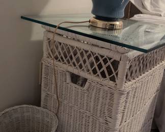 C75 - $45. Wicker Hamper. Currently used as a side table with thick glass over lay.  Measures 17.5" wide x 14" deep x 24" tall. 