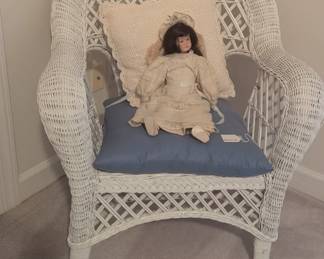 C74 - $75.  Antique Wicker Chair. Measures 29" wide x 24.5" deep 35" tall. 