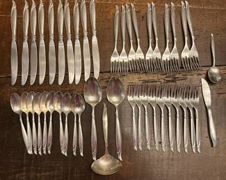 S2 - $1500. "Sentimental" Heirloom Sterling. 10 Forks, 10 Salad Forks, 10 Knives, 10 Spoons. 4 Serving Pieces. 