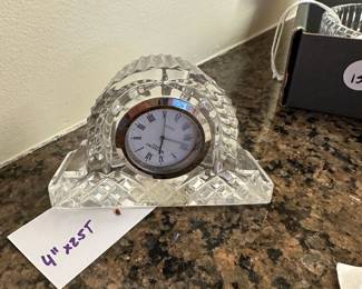 C57- $8. Waterford Sm Desk top Clock.  Clock mechanism needs to be re-glued in place.