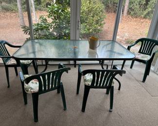 Glass top patio table and 4 chairs