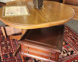 Dining table with two leaves, end table, one of several rugs