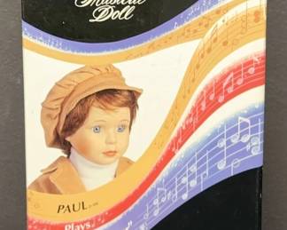 The Heritage Mint Platinum Collection Paul Porcelain Musical Doll