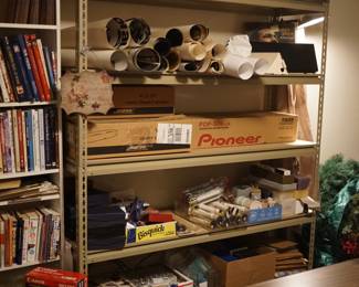 Vintage posters, few records, Bose and Pioneer center channels