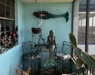 Beautiful bronze mermaid sculptures