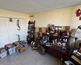 The "mancave" where the bulk of the books and other sports themed memorabilia are found
