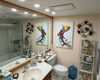 Second bath with lots of aquatic themed decor