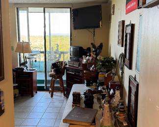 The "mancave" where the bulk of the books and other sports themed memorabilia are found