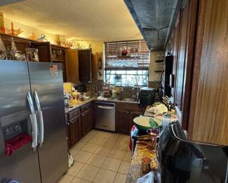 This kitchen is chocked full of china and crystal as well as other kitchen wares. Everything is for sale except the main appliances.