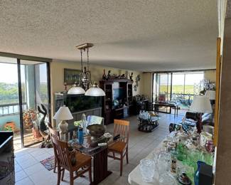 Dining/living room with many unique collectibles on display.