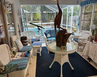 White wicker resin patio set
Table with two chairs
Settee, two side chairs..Excellent condition!!