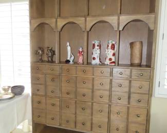 Apothacary with drawers and shelves.