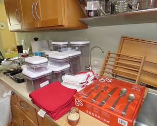 Very full kitchen with many items new in boxes.