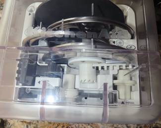 Storage case with blades for Kitchen Aid food processor, all new never used.