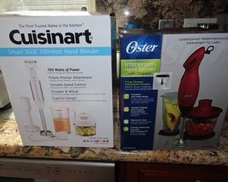 Cuisinart Smart Stick Hand Blender and an Oster Immersion hand Blender with Chopper. Both items are new in their boxes.