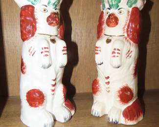 Two matching Staffordshire like dogs.