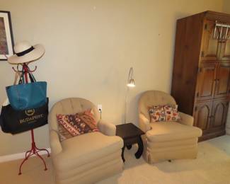 Two matching armchairs, floor lamp and small Asian style stool/table.