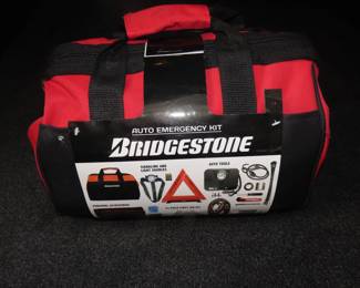 New in bag Firestone emergency roadside car kit.