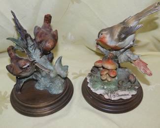 Two bird figures.