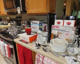 Very full kitchen with many items new in boxes.