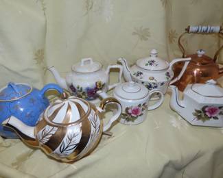 Selection of bone china teapots.