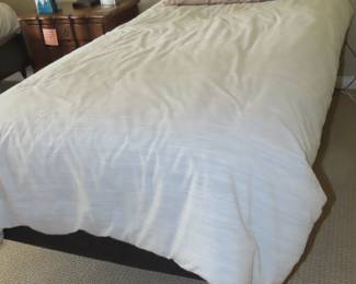 One of two twin beds.