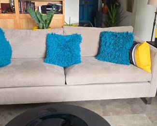 Tan Couch with Turq Pillows