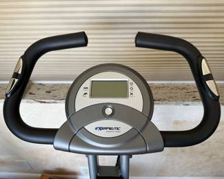 Exerpeutic Folding Magnetic Upright Exercise Bike, $75