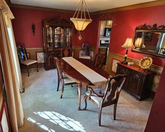 Dining room set which includes table, hutch and cabinet