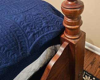 Carved wood post which is part of solid wood 3 piece king size bedroom set