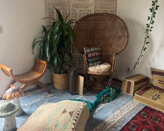 Antique chair. Peacock chair. Moroccan poufs. Rugs. Room divider 