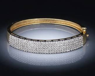 Ladies Gold and Diamond Bangle
