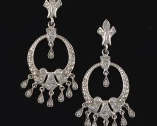A Pair of Gold and Diamond Earrings 
